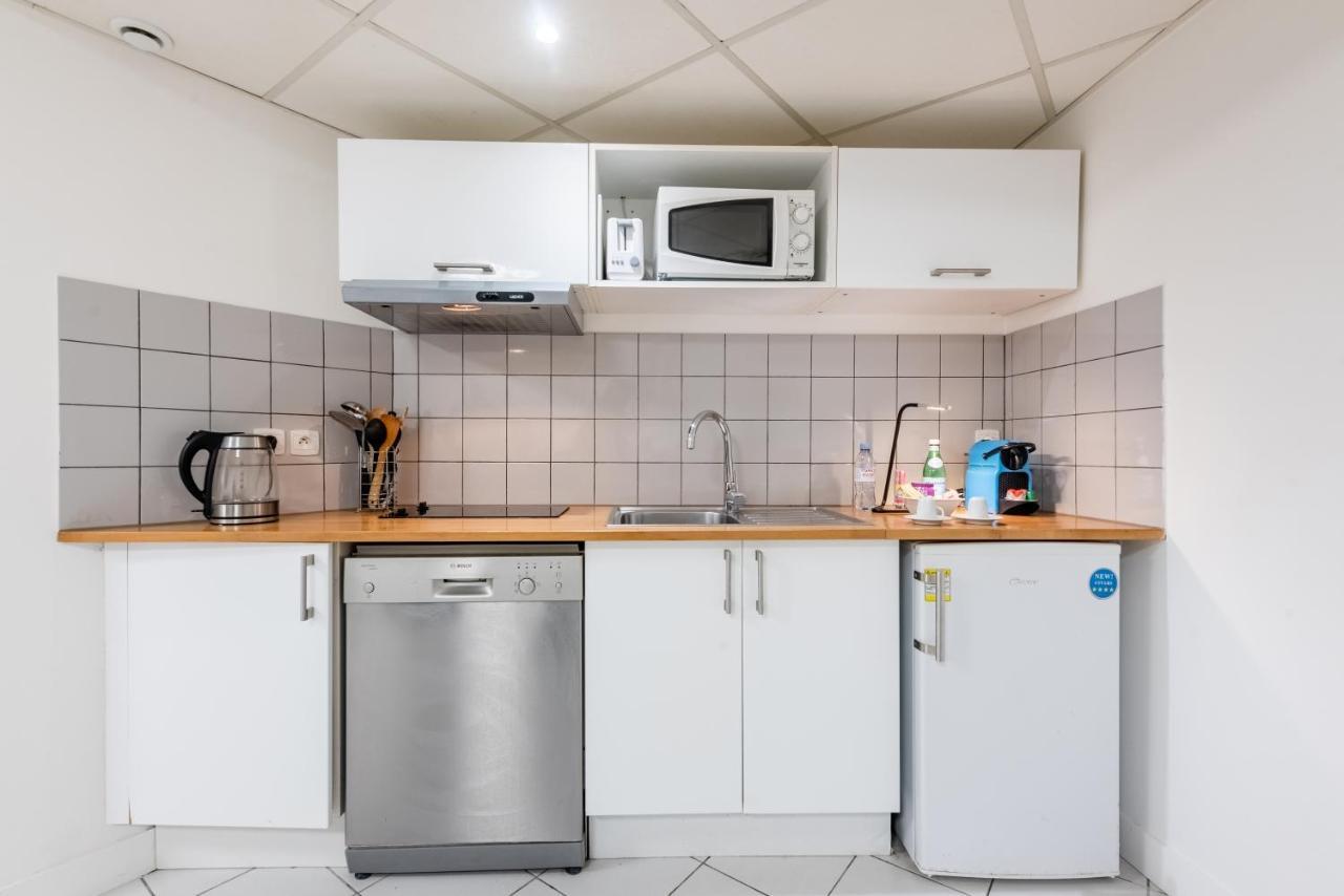 Triplex Magenta Quest Apartment Paris Bagian luar foto
